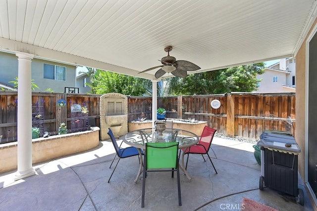 11180 Bridgefield Ct, Riverside, CA 92505 - fenced backyard featuring a patio area, outdoor dining area, grilling area, and a ceiling fan