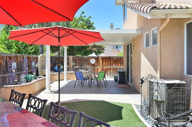 11180 Bridgefield Ct, Riverside, CA 92505 - fenced backyard featuring a patio area and outdoor dining space