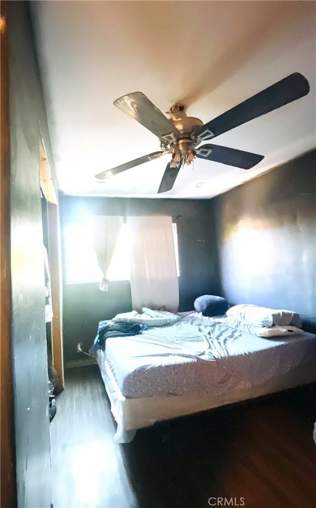 1130 S Rene Dr, Santa Ana, CA 92704 - bedroom featuring wood finished floors and a ceiling fan