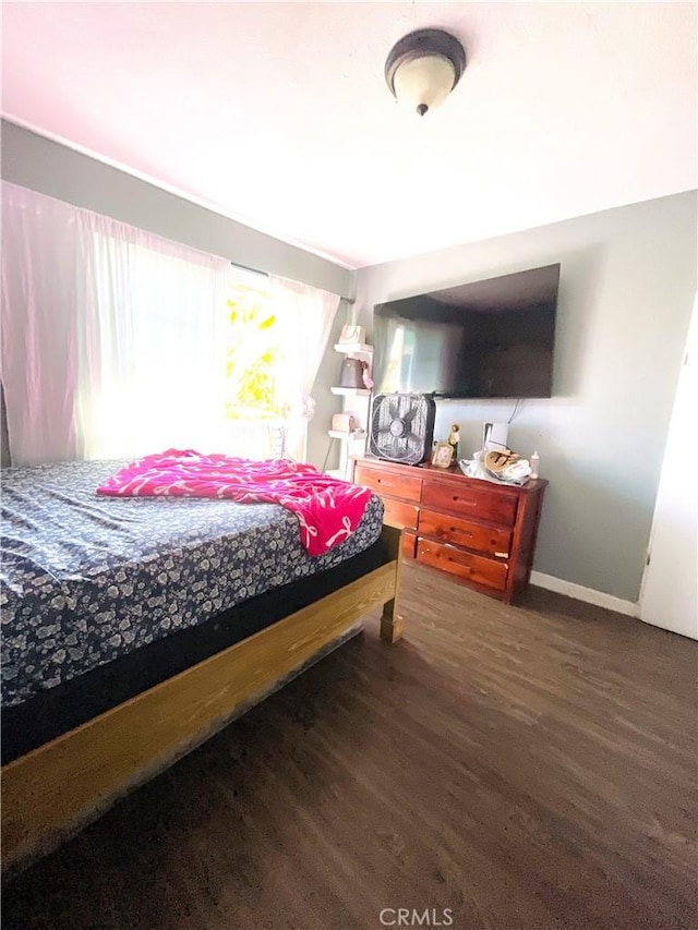 1130 S Rene Dr, Santa Ana, CA 92704 - bedroom with wood finished floors and baseboards