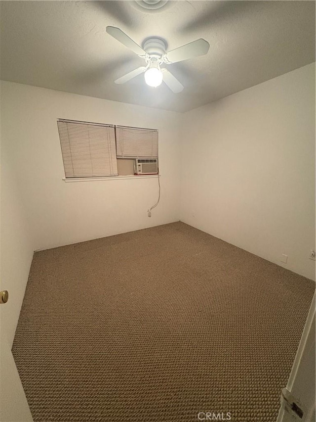 7103 Hanford Ave, Yucca Valley, CA 92284 - spare room with a ceiling fan, cooling unit, and carpet