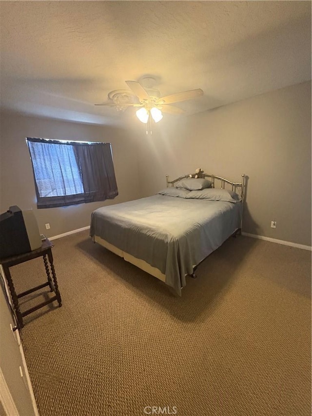 7103 Hanford Ave, Yucca Valley, CA 92284 - bedroom with carpet, ceiling fan, and a textured ceiling