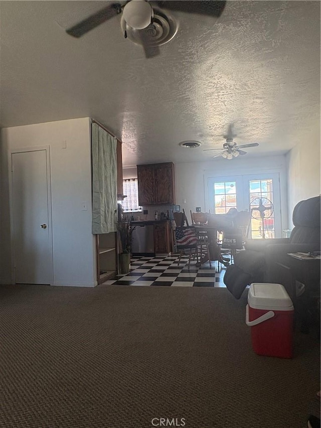 7103 Hanford Ave, Yucca Valley, CA 92284 - living room with a ceiling fan and a textured ceiling