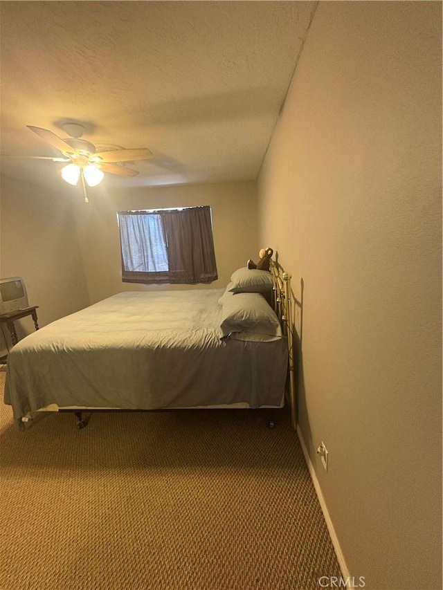 7103 Hanford Ave, Yucca Valley, CA 92284 - carpeted bedroom featuring ceiling fan and baseboards