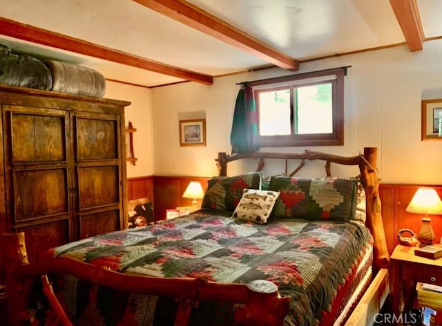 33140 Juniper Ln, Green Valley Lake, CA 92341 - bedroom with beam ceiling and a decorative wall
