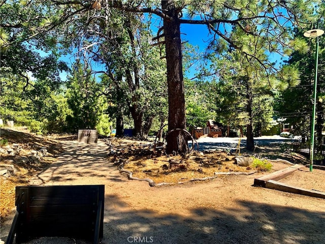 33140 Juniper Ln, Green Valley Lake, CA 92341 - view of yard featuring view of wooded area