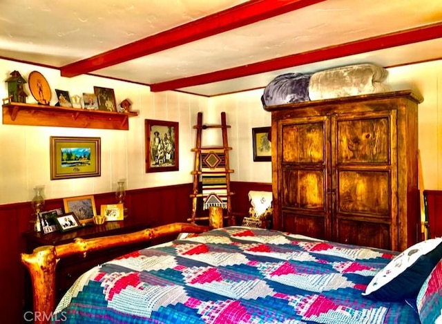 33140 Juniper Ln, Green Valley Lake, CA 92341 - bedroom featuring beamed ceiling and a wainscoted wall