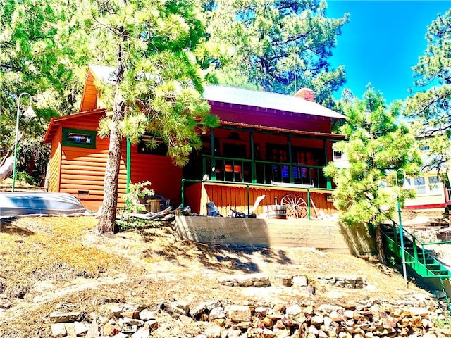 33140 Juniper Ln, Green Valley Lake, CA 92341 - view of front of property featuring a chimney
