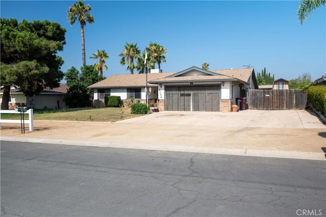 3134 Half Circle Rd, Norco, CA 92860 - single story home featuring a garage, driveway, and brick siding