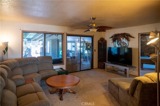 3134 Half Circle Rd, Norco, CA 92860 - living area with carpet floors, a textured ceiling, and ceiling fan