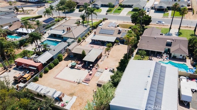 3134 Half Circle Rd, Norco, CA 92860 - aerial perspective of suburban area with a pool