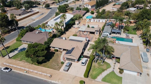 3134 Half Circle Rd, Norco, CA 92860 - aerial view of property and surrounding area featuring a pool and nearby suburban area
