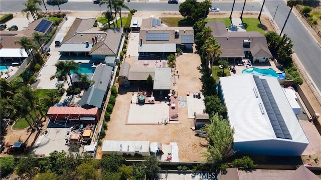 3134 Half Circle Rd, Norco, CA 92860 - aerial perspective of suburban area with a pool