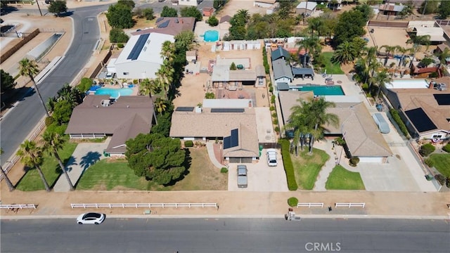3134 Half Circle Rd, Norco, CA 92860 - aerial overview of property's location with a pool area and nearby suburban area