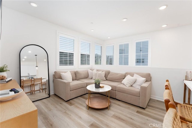 11046 Wander Dr, Rancho Cucamonga, CA 91730 - living room with light wood-style floors and recessed lighting