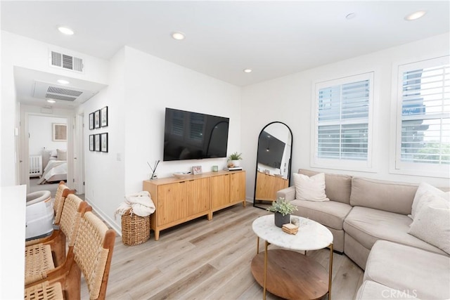 11046 Wander Dr, Rancho Cucamonga, CA 91730 - living room featuring light wood-style flooring and recessed lighting