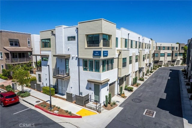11046 Wander Dr, Rancho Cucamonga, CA 91730 - view of building exterior with a garage