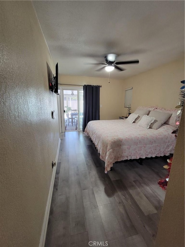 11521 Mclaren St, Norwalk, CA 90650 - bedroom with wood finished floors, access to outside, a textured wall, and ceiling fan