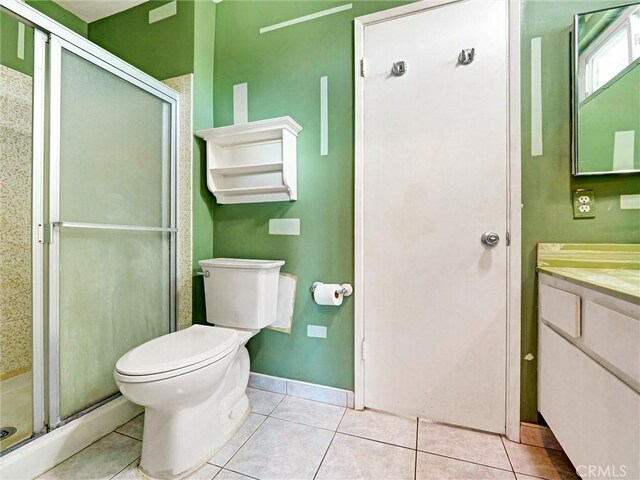 346 E Plymouth St, Glendora, CA 91740 - full bathroom featuring vanity, tile patterned floors, and a shower stall