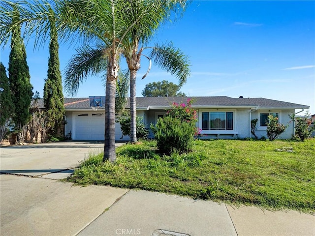 346 E Plymouth St, Glendora, CA 91740 - single story home with stucco siding, a garage, driveway, and a front lawn