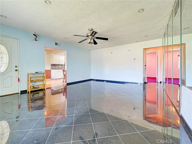 346 E Plymouth St, Glendora, CA 91740 - foyer with a ceiling fan, a textured ceiling, and granite tiled floors