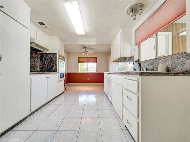 346 E Plymouth St, Glendora, CA 91740 - kitchen with backsplash, light tile patterned floors, ceiling fan, white appliances, and white cabinetry