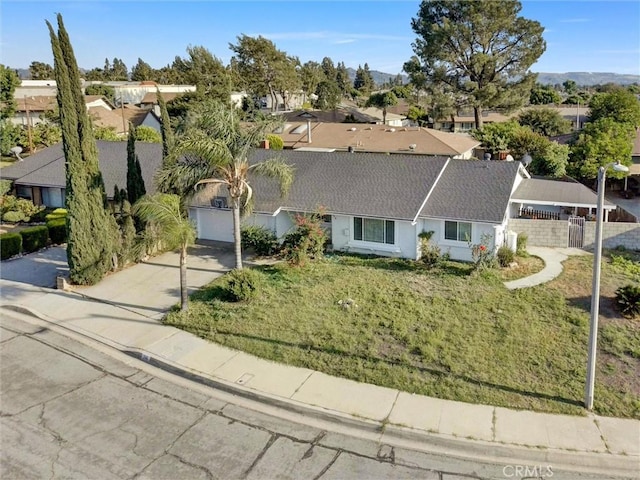 346 E Plymouth St, Glendora, CA 91740 - view of front of property with a residential view, driveway, a garage, and a shingled roof