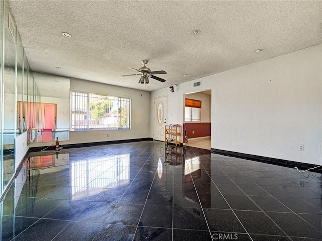 346 E Plymouth St, Glendora, CA 91740 - empty room with granite tiled floors, a ceiling fan, and a textured ceiling