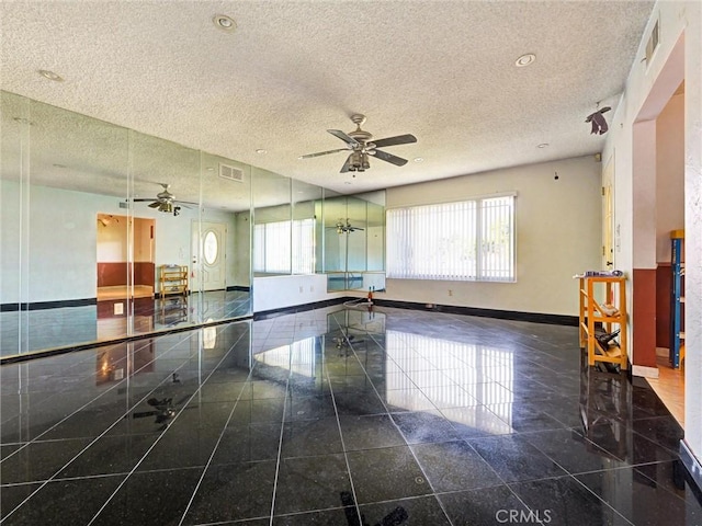 346 E Plymouth St, Glendora, CA 91740 - unfurnished room with granite floors, plenty of natural light, a textured ceiling, ceiling fan, and recessed lighting
