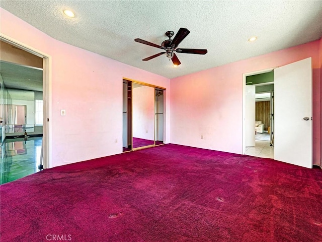 346 E Plymouth St, Glendora, CA 91740 - unfurnished bedroom with carpet floors, a textured ceiling, a closet, and ceiling fan
