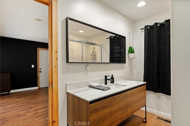 1348 Manzanita Way, Lake Arrowhead, CA 92352 - full bathroom featuring vanity, curtained shower, wood finished floors, and recessed lighting