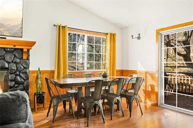 1348 Manzanita Way, Lake Arrowhead, CA 92352 - dining area with wainscoting, vaulted ceiling, wood finished floors, and wood walls