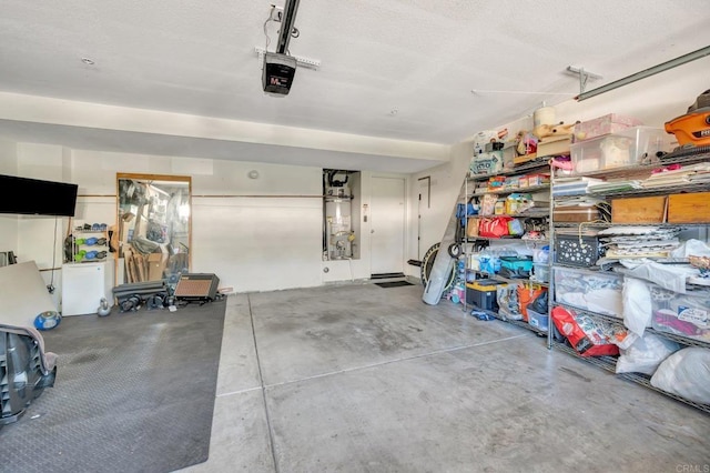14658 Via Fiesta Unit 2, San Diego, CA 92127 - garage featuring a garage door opener
