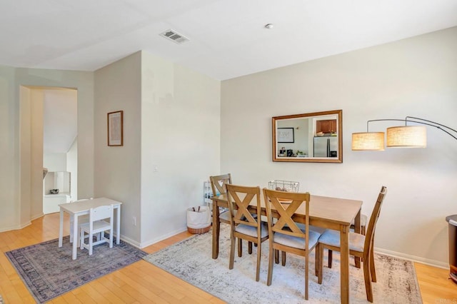 14658 Via Fiesta Unit 2, San Diego, CA 92127 - dining area with hardwood / wood-style floors