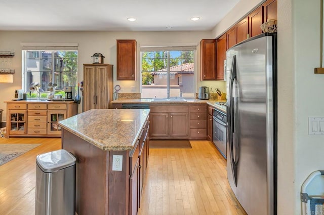 14658 Via Fiesta Unit 2, San Diego, CA 92127 - kitchen featuring stainless steel appliances, light wood-style flooring, plenty of natural light, a kitchen island, and recessed lighting