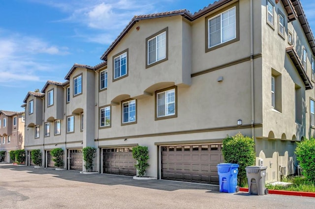14658 Via Fiesta Unit 2, San Diego, CA 92127 - view of property featuring a garage and a residential view