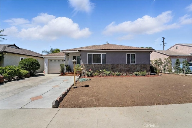 123 E Andrix St, Monterey Park, CA 91755 - single story home featuring an attached garage, stucco siding, stone siding, and concrete driveway