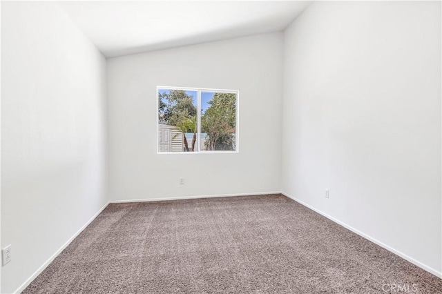 1083 Mill Iron Way, San Jacinto, CA 92583 - carpeted empty room featuring baseboards and lofted ceiling