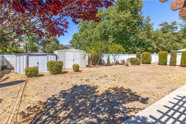 1083 Mill Iron Way, San Jacinto, CA 92583 - fenced backyard featuring a storage unit