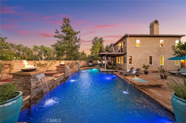 28889 Edenton Way, Temecula, CA 92591 - view of pool with an outdoor fire pit, a patio, and a pool with connected hot tub