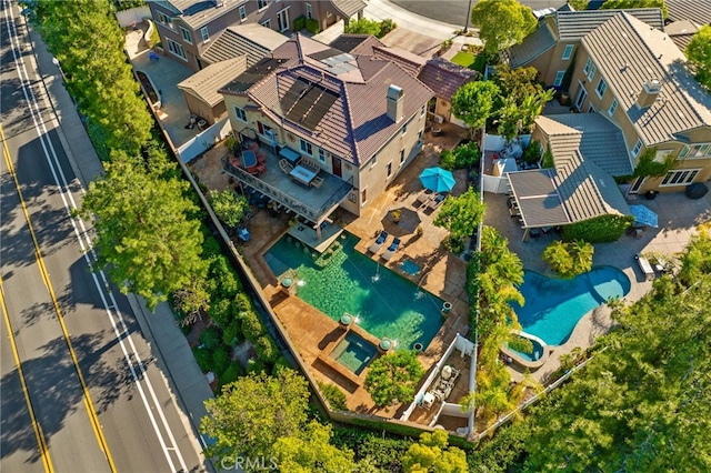 28889 Edenton Way, Temecula, CA 92591 - aerial perspective of suburban area featuring a pool and property boundaries highlighted