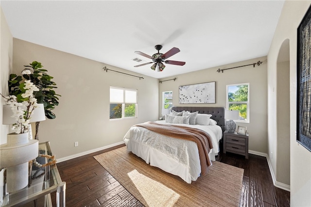 28889 Edenton Way, Temecula, CA 92591 - bedroom with multiple windows, dark wood finished floors, and arched walkways