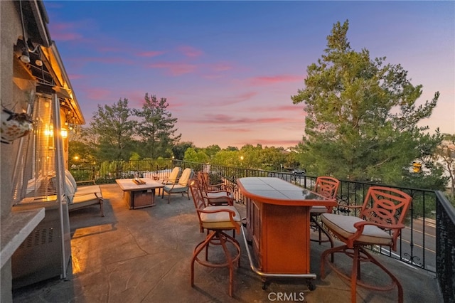 28889 Edenton Way, Temecula, CA 92591 - patio terrace at dusk with a fire pit and a patio area