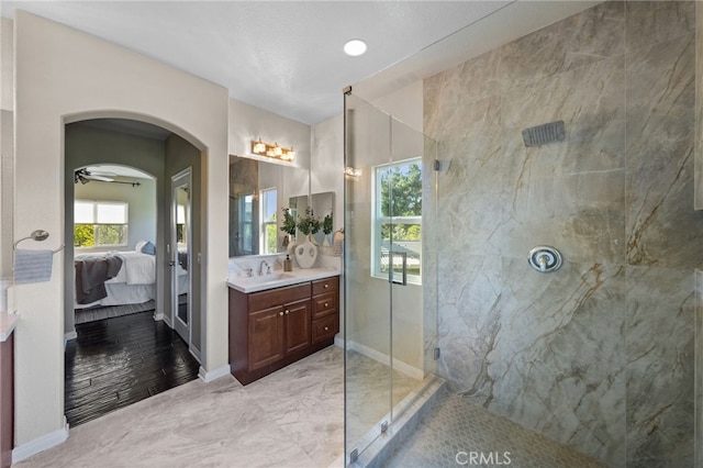 28889 Edenton Way, Temecula, CA 92591 - ensuite bathroom with a marble finish shower, vanity, marble finish flooring, and a ceiling fan