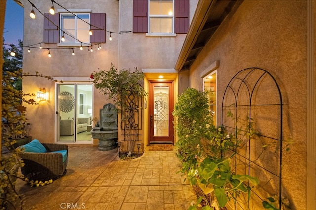 28889 Edenton Way, Temecula, CA 92591 - entrance to property with a patio and stucco siding