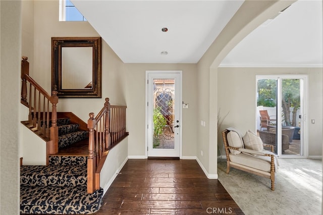 28889 Edenton Way, Temecula, CA 92591 - foyer entrance with arched walkways, wood-type flooring, and stairway
