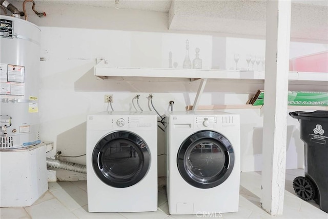 9576 Via Bernardo, Burbank, CA 91504 - laundry area featuring strapped water heater, separate washer and dryer, and light tile patterned floors