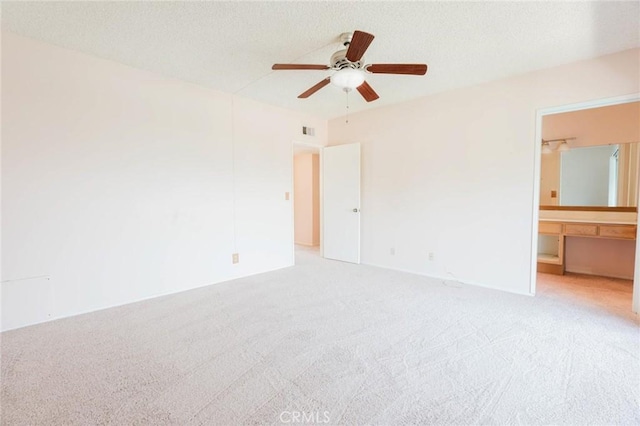 9576 Via Bernardo, Burbank, CA 91504 - unfurnished bedroom featuring light colored carpet, ensuite bath, and a ceiling fan