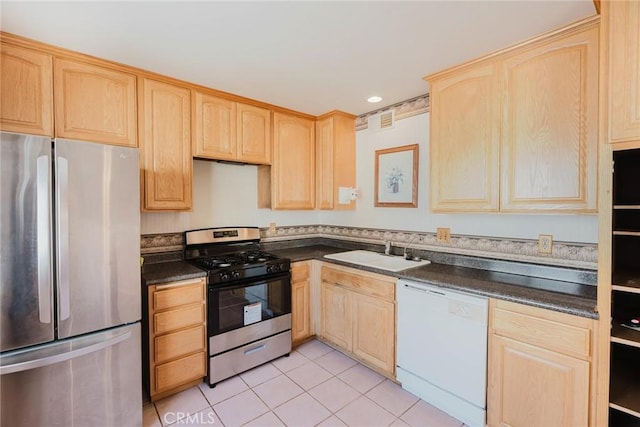 9576 Via Bernardo, Burbank, CA 91504 - kitchen featuring stainless steel appliances, light brown cabinets, dark countertops, light tile patterned floors, and recessed lighting