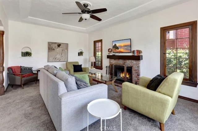 239 Nieto Ave Unit A, Long Beach, CA 90803 - living room with a fireplace, carpet, ceiling fan, and a raised ceiling